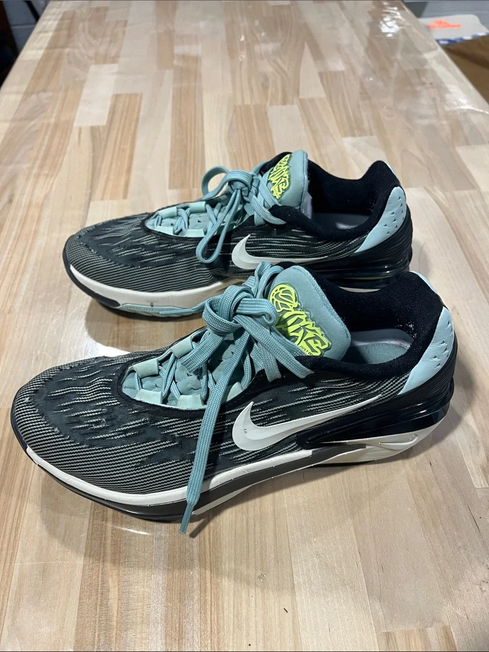 Nike Black and Mint Low-Top Basketball Shoes